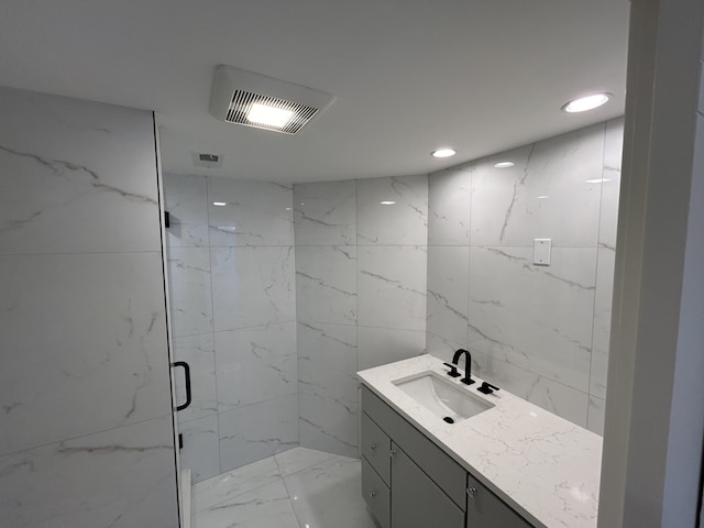 bathroom featuring vanity and walk in shower