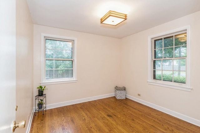 empty room featuring hardwood / wood-style floors