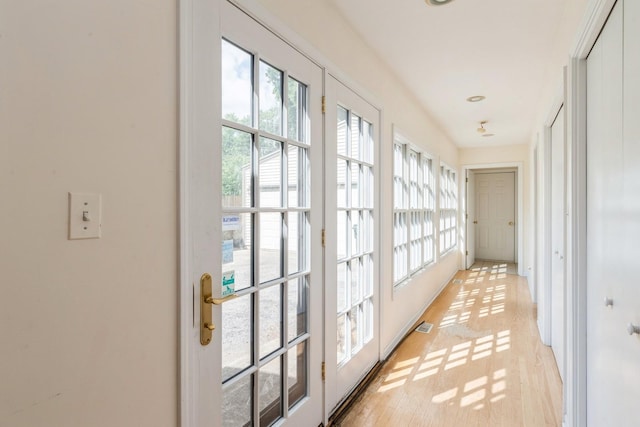 doorway featuring light wood-type flooring