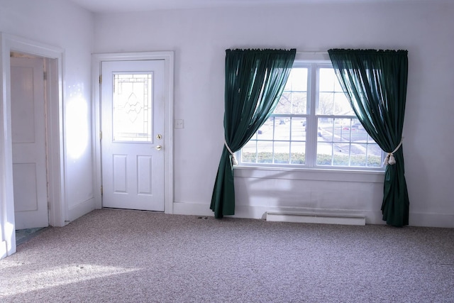 interior space featuring baseboard heating