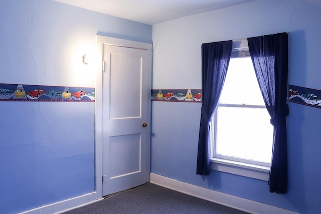 401 Ash Ave, Morrison, IL 61270 - unfurnished room featuring baseboards
