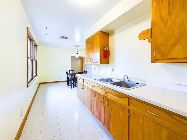 unfurnished bedroom featuring wood walls, light carpet, and lofted ceiling