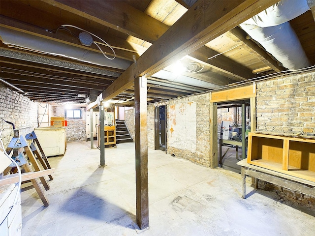 basement with washer / dryer and stairway