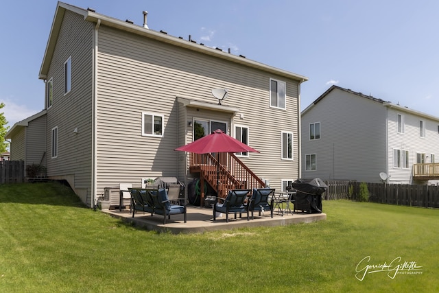 3616 Thomas Ct, Plano, IL 60545 - back of property with a patio
