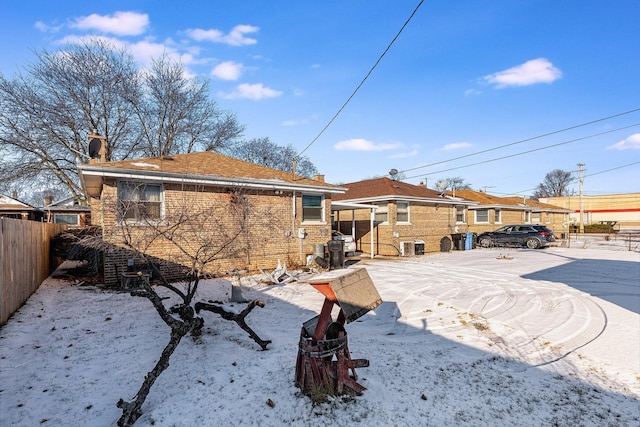 view of snow covered house