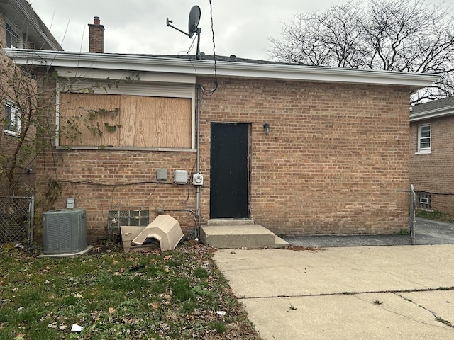 doorway to property with central air condition unit