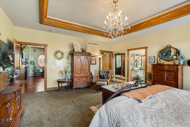 bedroom with crown molding, a raised ceiling, visible vents, dark carpet, and baseboards