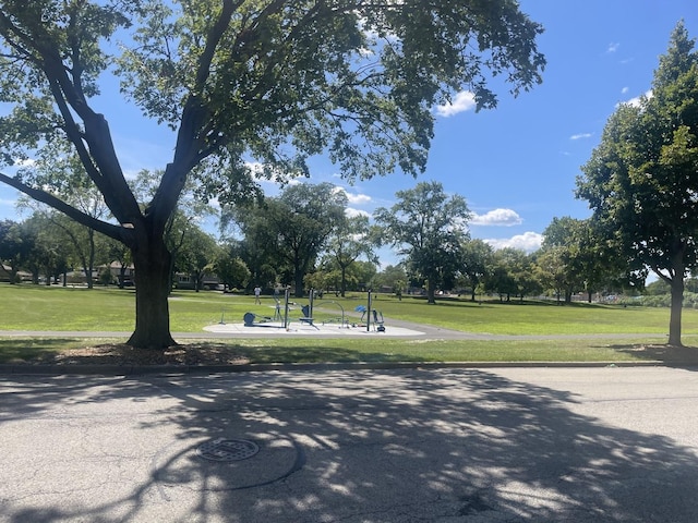 view of community featuring a yard