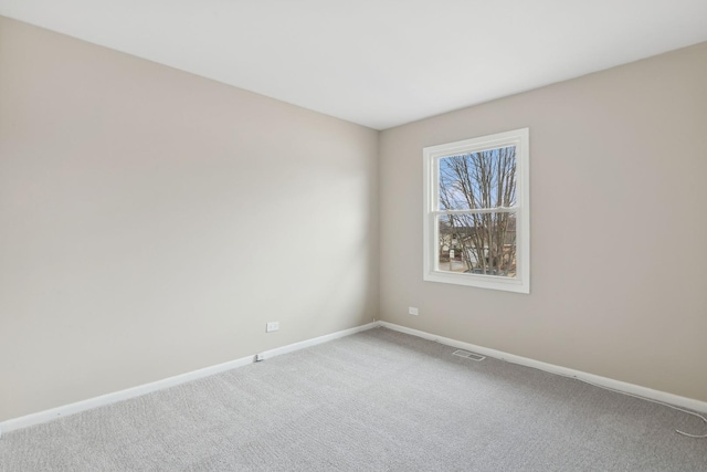 view of carpeted spare room