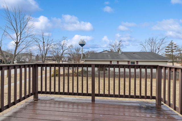 wooden terrace with a yard