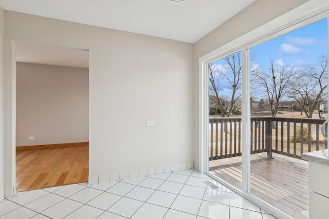 empty room featuring light tile patterned floors