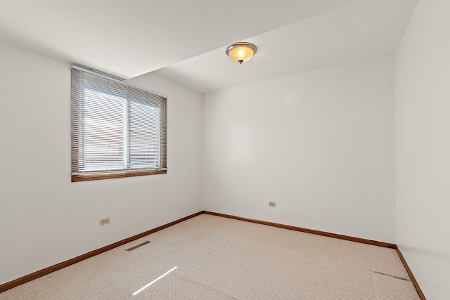 view of carpeted spare room