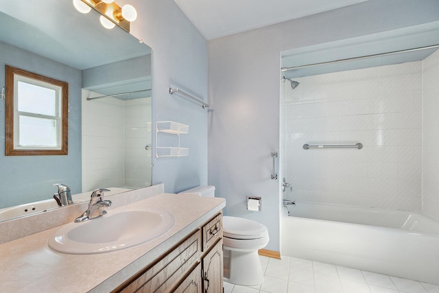 full bathroom with tile patterned floors, tiled shower / bath combo, toilet, and vanity