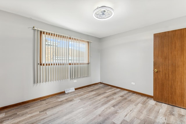 empty room featuring light hardwood / wood-style floors