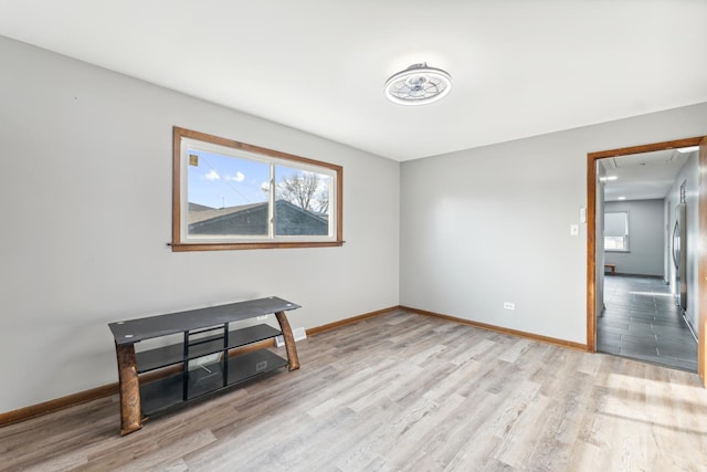 unfurnished room with light hardwood / wood-style floors