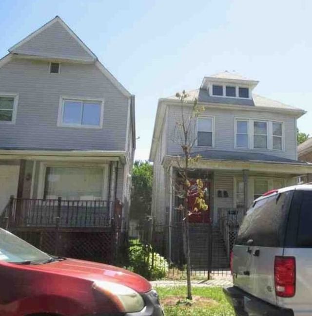 view of front property featuring covered porch