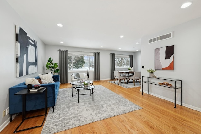 living room with hardwood / wood-style floors