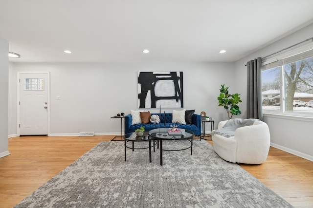 sitting room featuring hardwood / wood-style flooring