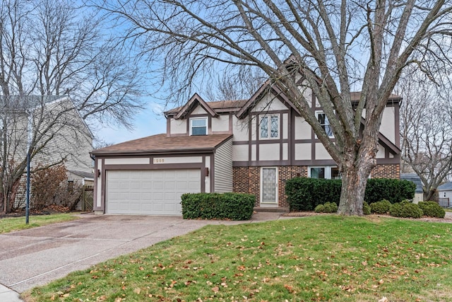 view of front of home featuring a front lawn and a garage