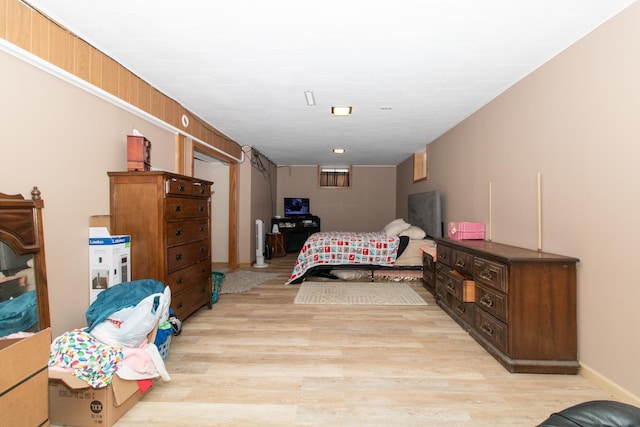 bedroom with light wood-type flooring