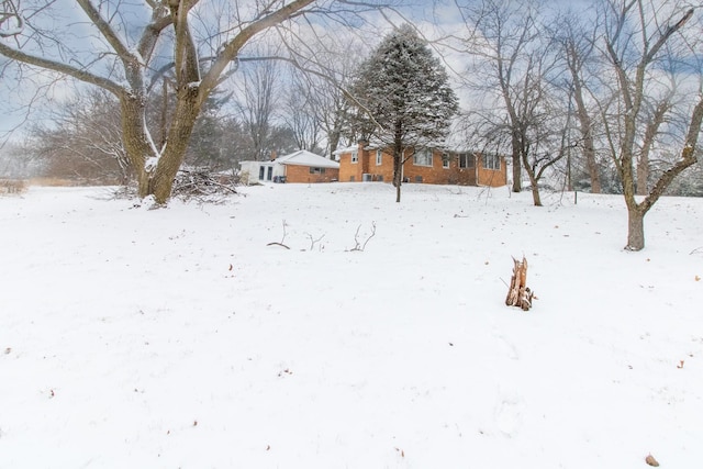 view of snowy yard