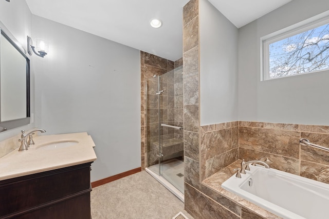 bathroom featuring tile patterned floors, vanity, and separate shower and tub