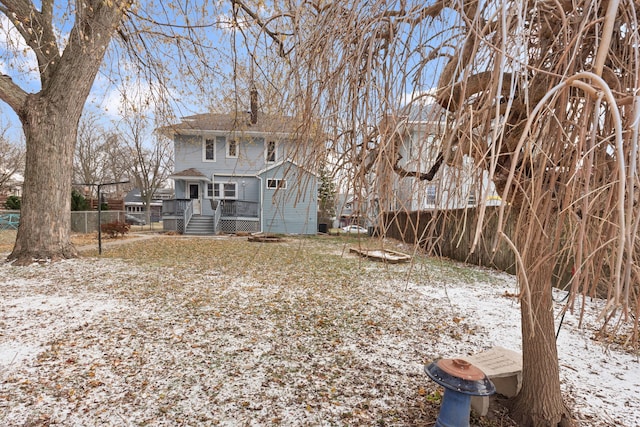 view of yard layered in snow