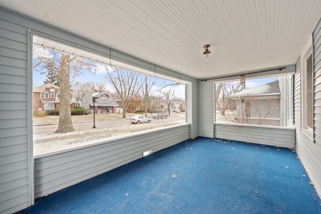 unfurnished sunroom with a healthy amount of sunlight