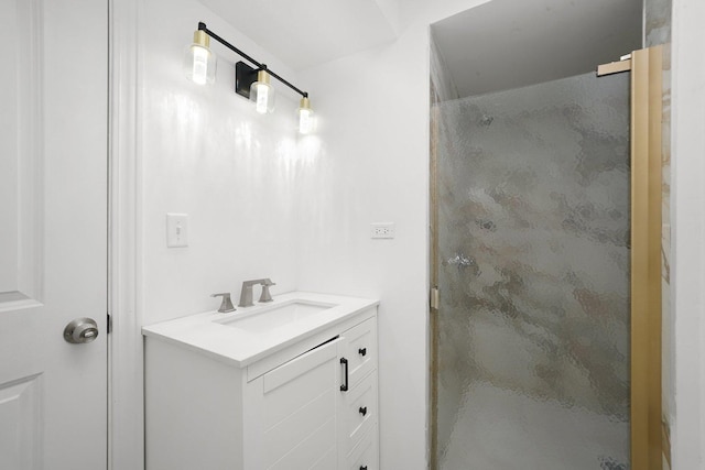 bathroom featuring an enclosed shower and vanity