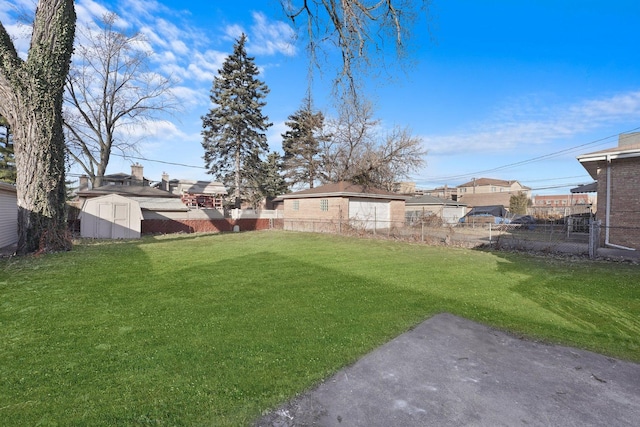 view of yard with a storage shed