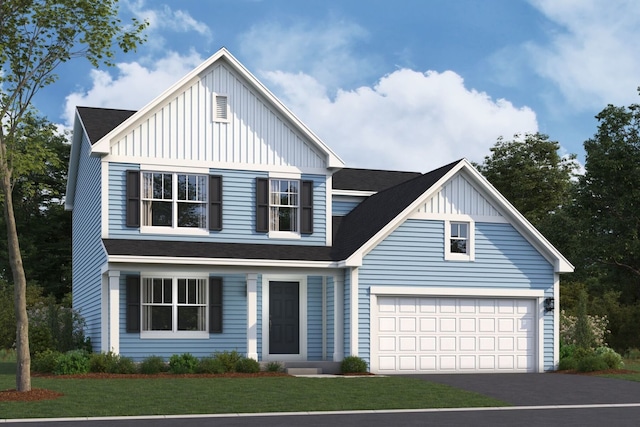 view of front facade featuring a garage and a front lawn