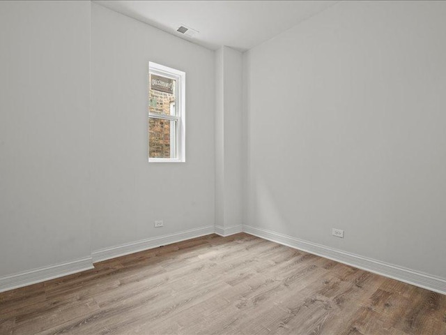 empty room featuring light hardwood / wood-style floors