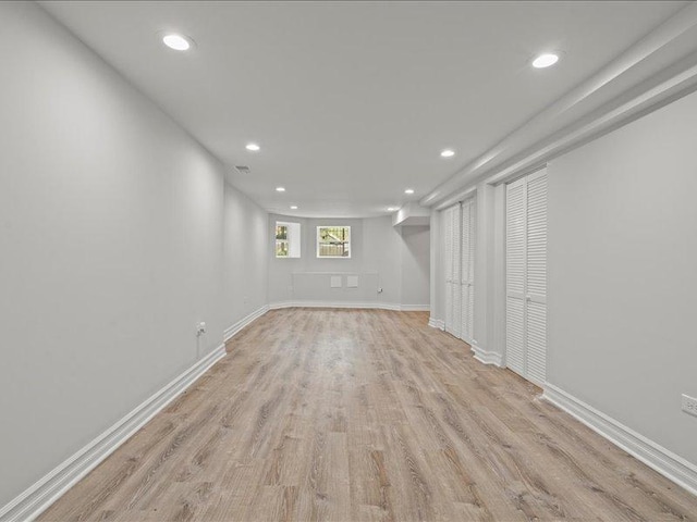 basement with light wood-type flooring