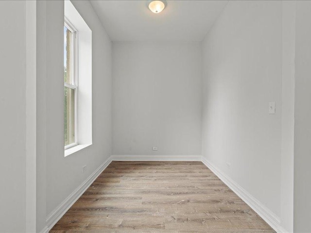 unfurnished room featuring light wood-type flooring