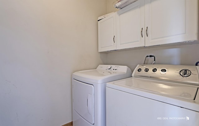 laundry room featuring cabinets and independent washer and dryer