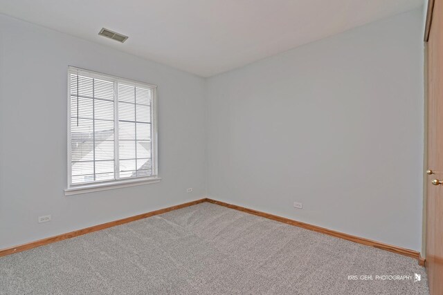 empty room featuring carpet floors