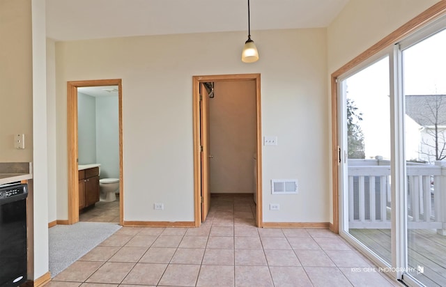 interior space with light tile patterned floors