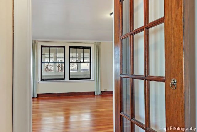 hallway featuring light wood-type flooring