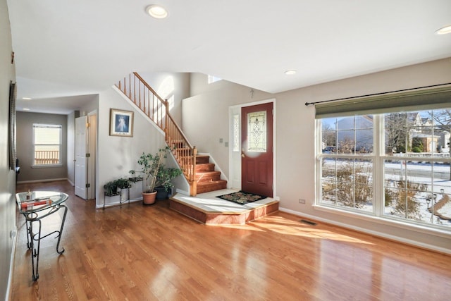 foyer entrance featuring wood-type flooring