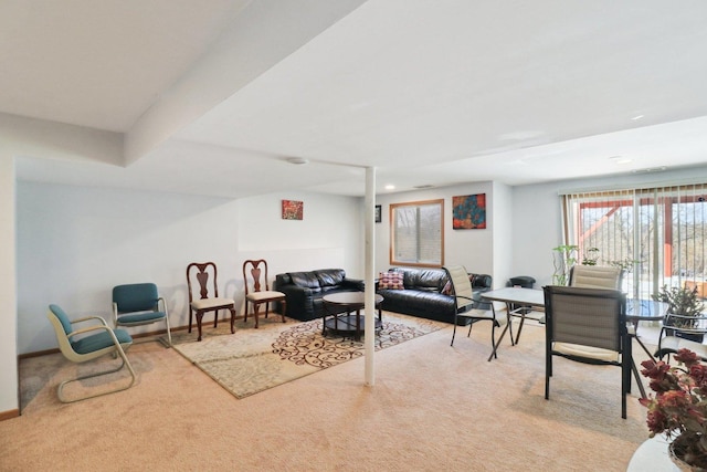 living room featuring light colored carpet