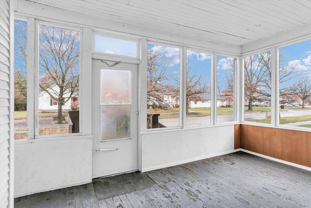 unfurnished sunroom with a healthy amount of sunlight