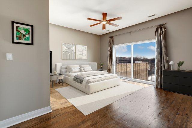 bedroom featuring ceiling fan, wood-type flooring, and access to outside