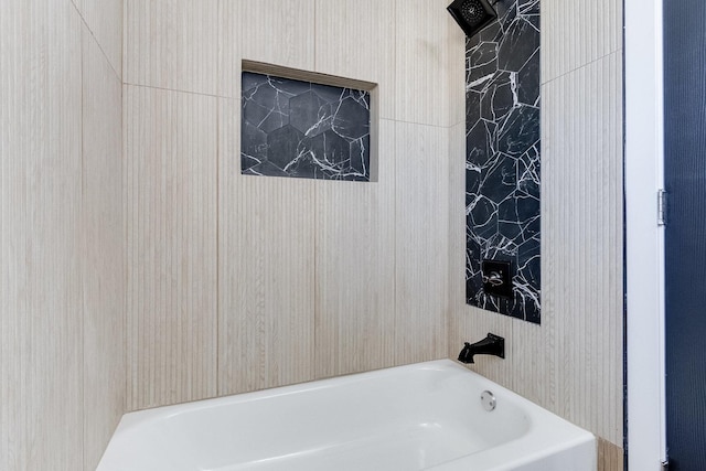 bathroom featuring washtub / shower combination