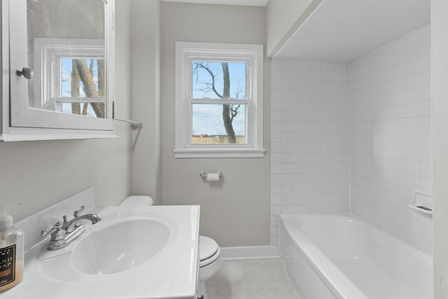 full bathroom with bathing tub / shower combination, a wealth of natural light, vanity, and toilet