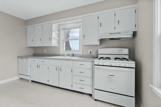 kitchen featuring sink, white cabinets, and white appliances