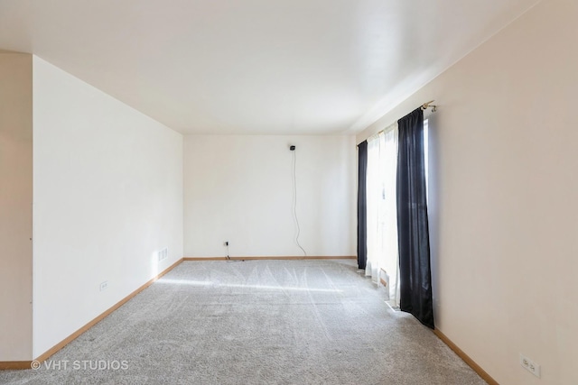 view of carpeted spare room