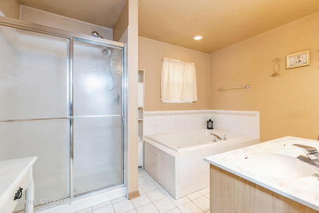 bathroom featuring tile patterned flooring, vanity, and plus walk in shower