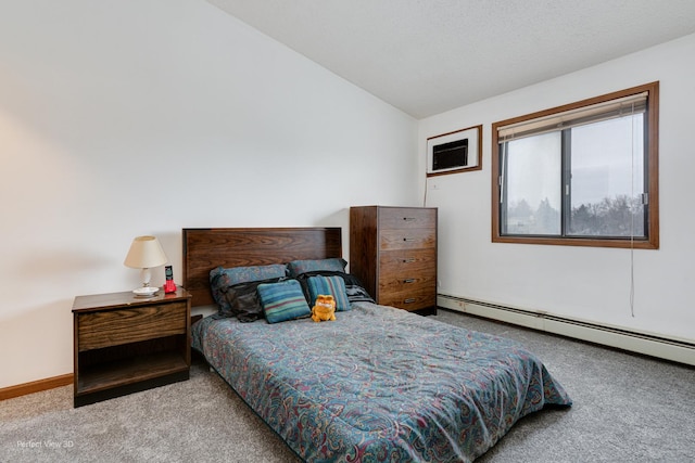 bedroom with carpet, a baseboard radiator, and vaulted ceiling