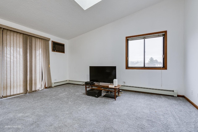 living area featuring carpet, a textured ceiling, a wall mounted AC, and a baseboard heating unit