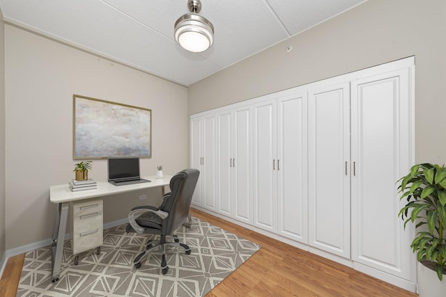 office area with light hardwood / wood-style flooring